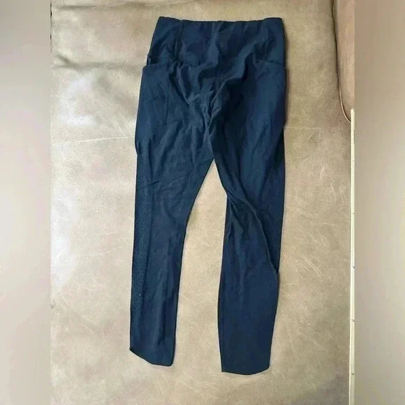 Athleta Black Leggings With Pockets Perforated Bottom Women’s Size Small - Picture 9 of 10